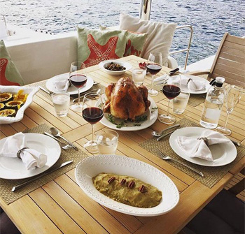 Dinner aboard a crewed yacht charter