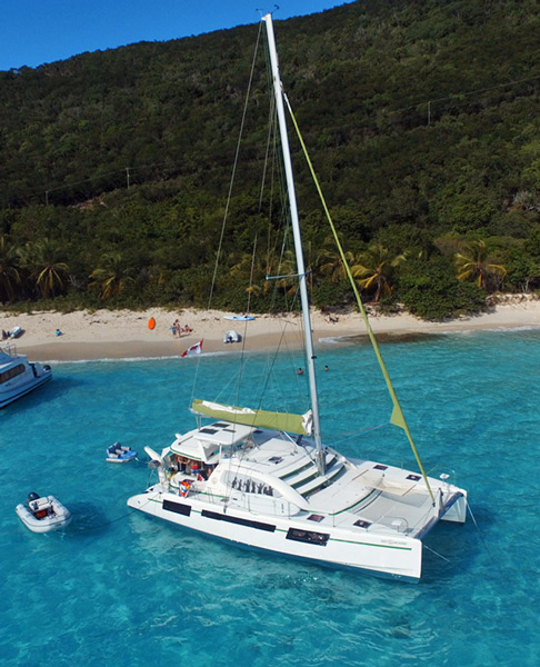 Knot Anchored Crewed Catamaran Charter